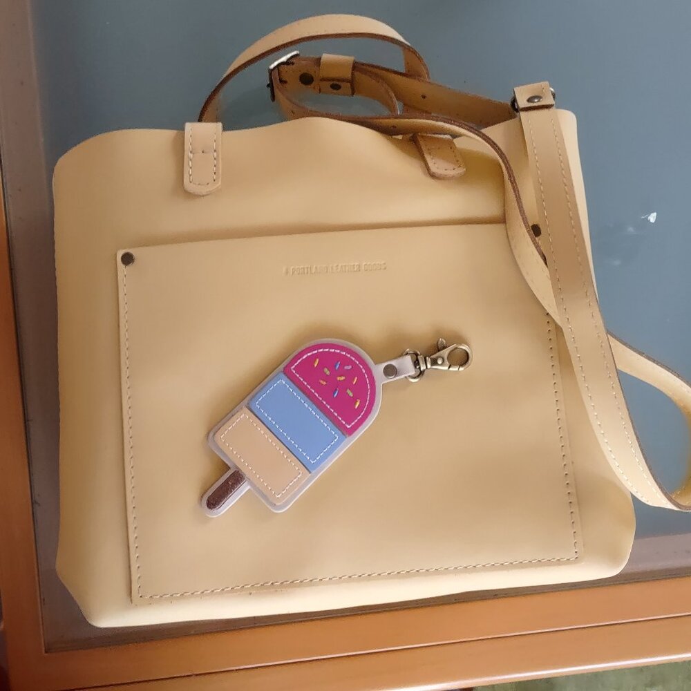 Portland Leather Medium crossbody tote and popsicle keychain flair